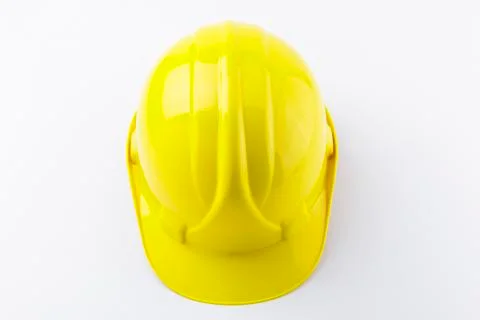 Yellow Hard Hat Flat Lay Centered on White Background Stock Photos