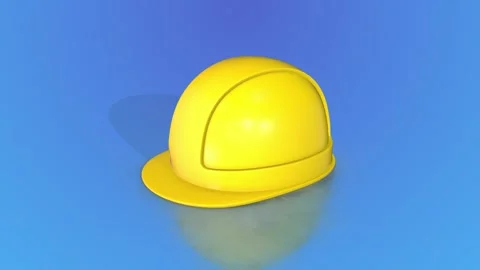 Yellow Hard Hat on a Reflective Floor Zooming Towards the Camera. Safety Helmet. Stock Footage 285326765