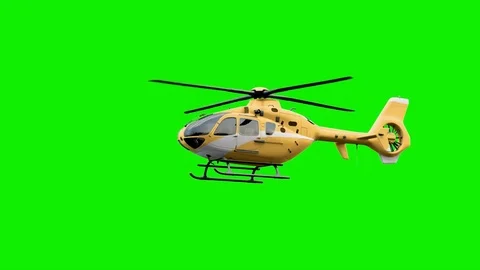The Yellow helicopter on green Stock Footage 77731716