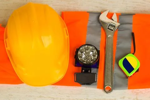 Yellow Helmet with work tools Stock Photos