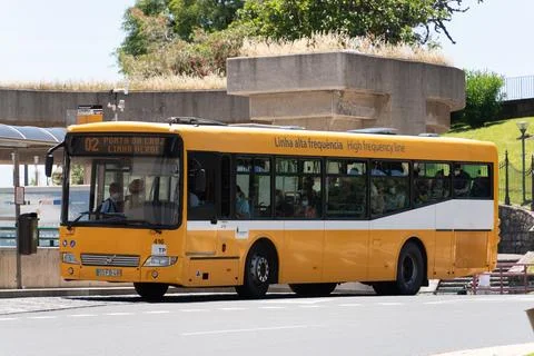 Yellow Horarios do Funchal bus at a station in Funchal, Madeira Stock Photos