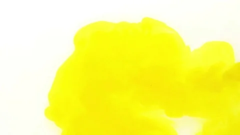 Yellow ink cloud swirling on white Vídeo Stock 72476934