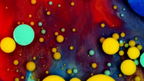 Yellow inks react to form a beautiful structure of paint bubbles. Multicolored Video stock 127197746