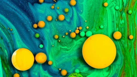 Yellow inks react to form a beautiful structure of paint bubbles. Colorful Video stock 127197881
