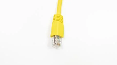 A yellow internet cables with a white background Stock Photos