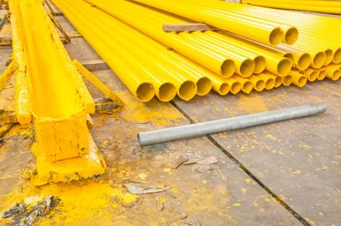 Yellow iron pipe Stock Photos