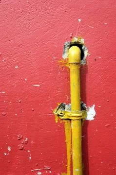 Yellow iron pipe Stock Photos