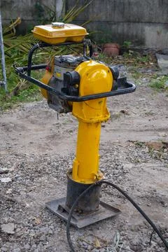 Yellow Jumping Jack Compactor Stock Photos