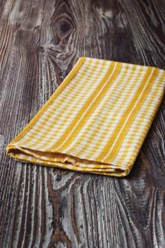 Yellow kitchen towel Stock Photos