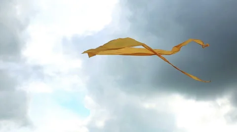 Yellow kite floating in the sky. Stock Footage 50579012