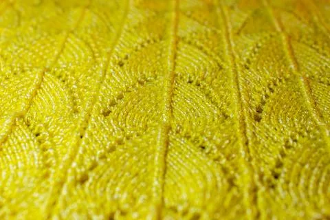Yellow knitted pattern Stock Photos