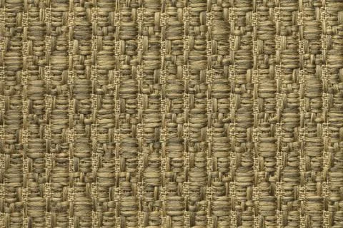 Yellow knitted woolen background with pattern of cloth. Texture of gold texti Stock Photos