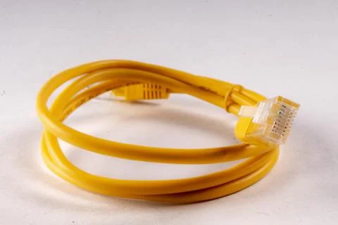 Yellow lan wire on white background Stock Photos