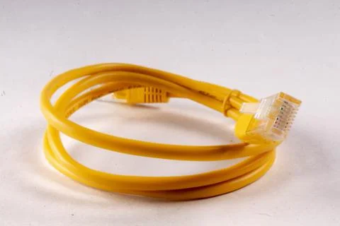 Yellow lan wire on white background Stock Photos