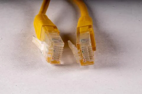 Yellow lan wire on white background Stock Photos