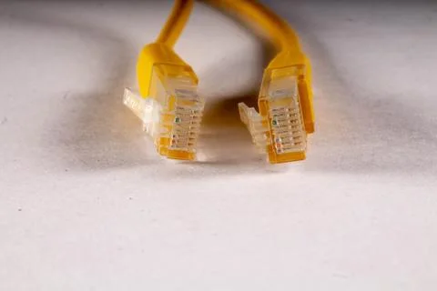 Yellow lan wire on white background Stock Photos
