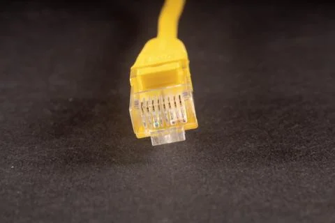 Yellow lan wire on white background Stock Photos