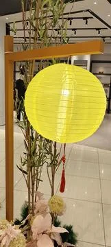 Yellow Lantern with Bamboo Display Stock Photos