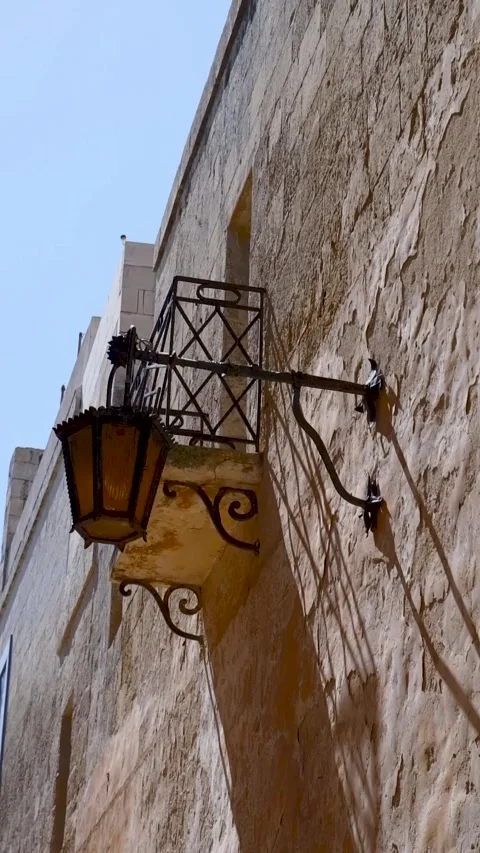 Yellow lantern on the building in the evening Stock Footage 300309004