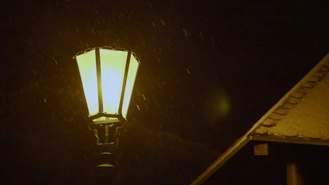 Yellow lantern in the snowing Stock Footage 101871975
