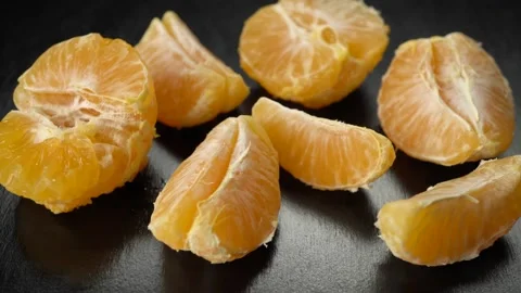 Yellow large raisins on a dark background Stock Footage 146513983