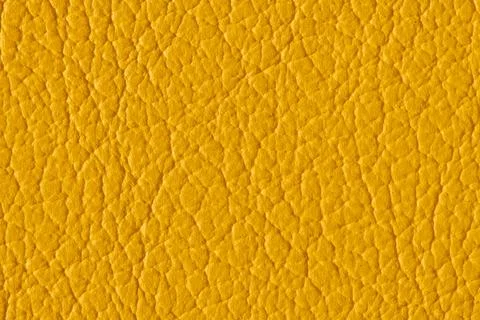 Yellow leather texture background with fine grain and natural pattern Stock Photos