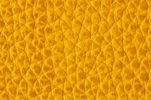 Yellow leather texture closeup Stock Photos