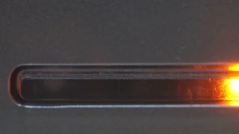 Yellow LED status lamp blinking through recording data on pc hard drive, close Video stock 82629508