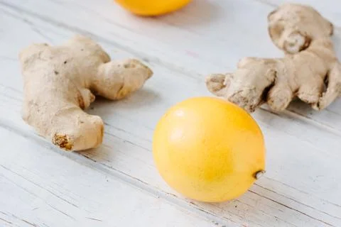 Yellow lemon and ginger root Stock Photos