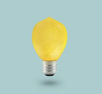 Yellow Lemon light bulb on bright blue background. Summer fun concept Stock Illustration