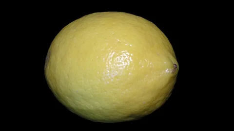 Yellow Lemon – Macro, Close up View on a Black Background Stock Footage 90219861
