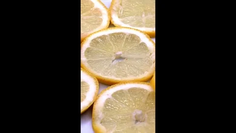 Yellow lemons sliced circle Stock Footage 323298061