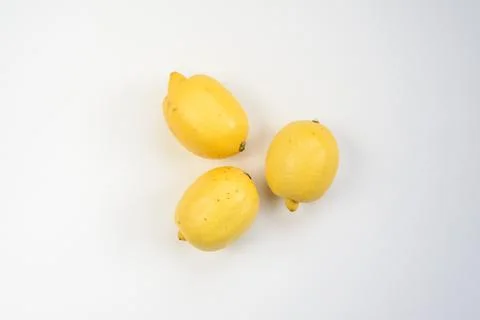 Yellow lemons on white background Stock Photos