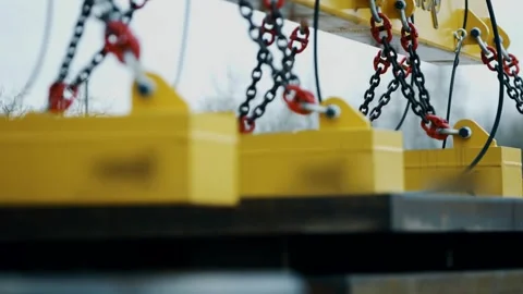 Yellow Lifting Beam With Chain Sling, Red Safety Hooks, Close Up Shot Video stock 341528082