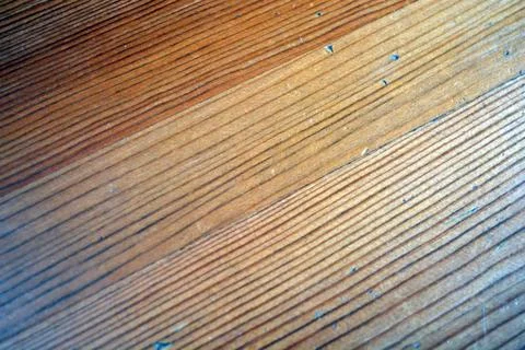 Yellow, light background made of natural wood, opened with building varnish. Fotos de archivo