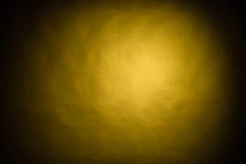 Yellow light on black background Stock Photos