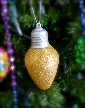 Yellow light bulb Stock Photos