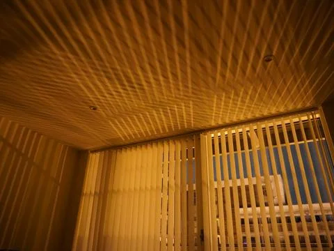 Yellow light from outside of the window Stock Photos