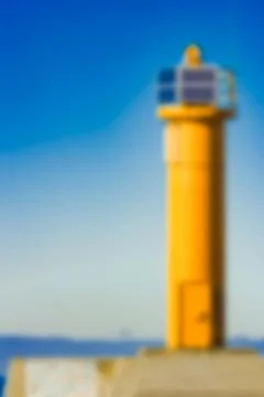 Yellow lighthouse - blurred image 写真素材