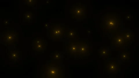 Yellow lights on a black background are moving fast. Golden fireflies. Stock Footage 167261092