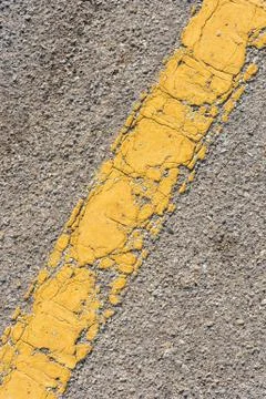 The yellow line on the old road 스톡 사진