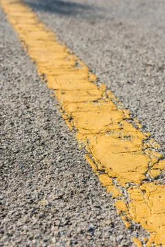 The yellow line on the old road Stock-Fotos