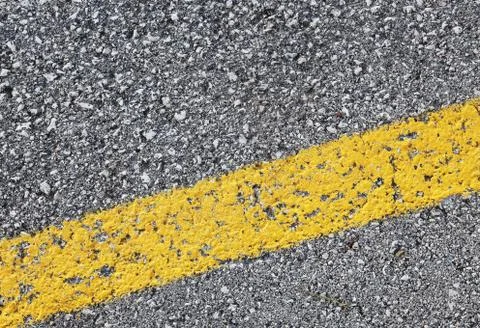 Yellow line in the road Stock Photos