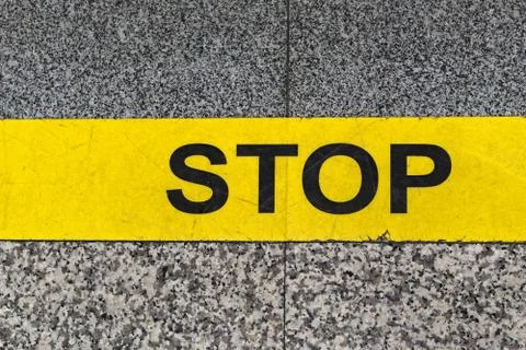 Yellow line stop Stock Photos