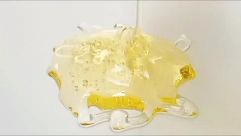 Yellow liquid gel texture face wash, shampoo, cleanser, cosmetic or skincare Stock Footage 285715362
