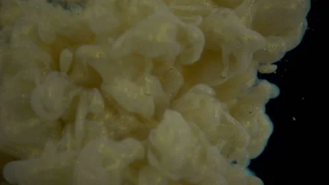Yellow Liquid Paint In Water Stock Footage 94369996