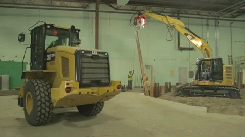 Yellow Loader and Excavator working Warehouse Construction Site Stock Footage 46337283