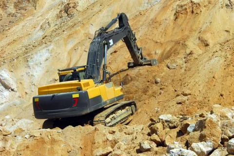 Yellow loader, dredge Stock Photos