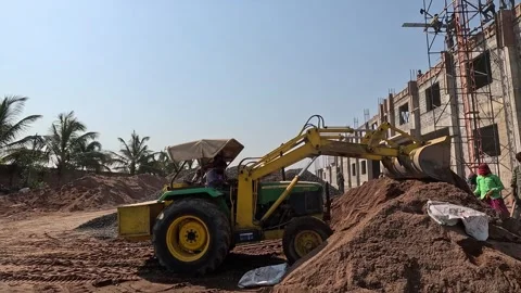 Yellow Loader Machine Moving Aggregate Material for Industrial Building Stock Footage 344477659