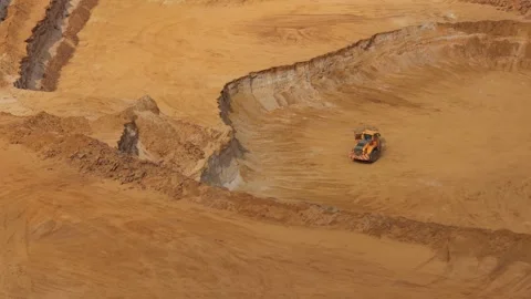 Yellow Loader Machine Moving Sand at a Construction Site During the Sunny 스톡 동영상 342771851